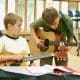 Guitar teacher and student