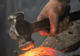 Extreme heat and constant pound by a heavy hammer are required for forging steel.
