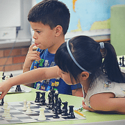 Chess player about to make a great move.