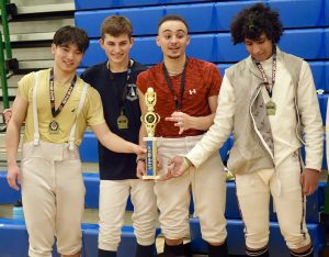 2023 MN State Champion Team.  Men's Foil Team holding their state championship trophy.